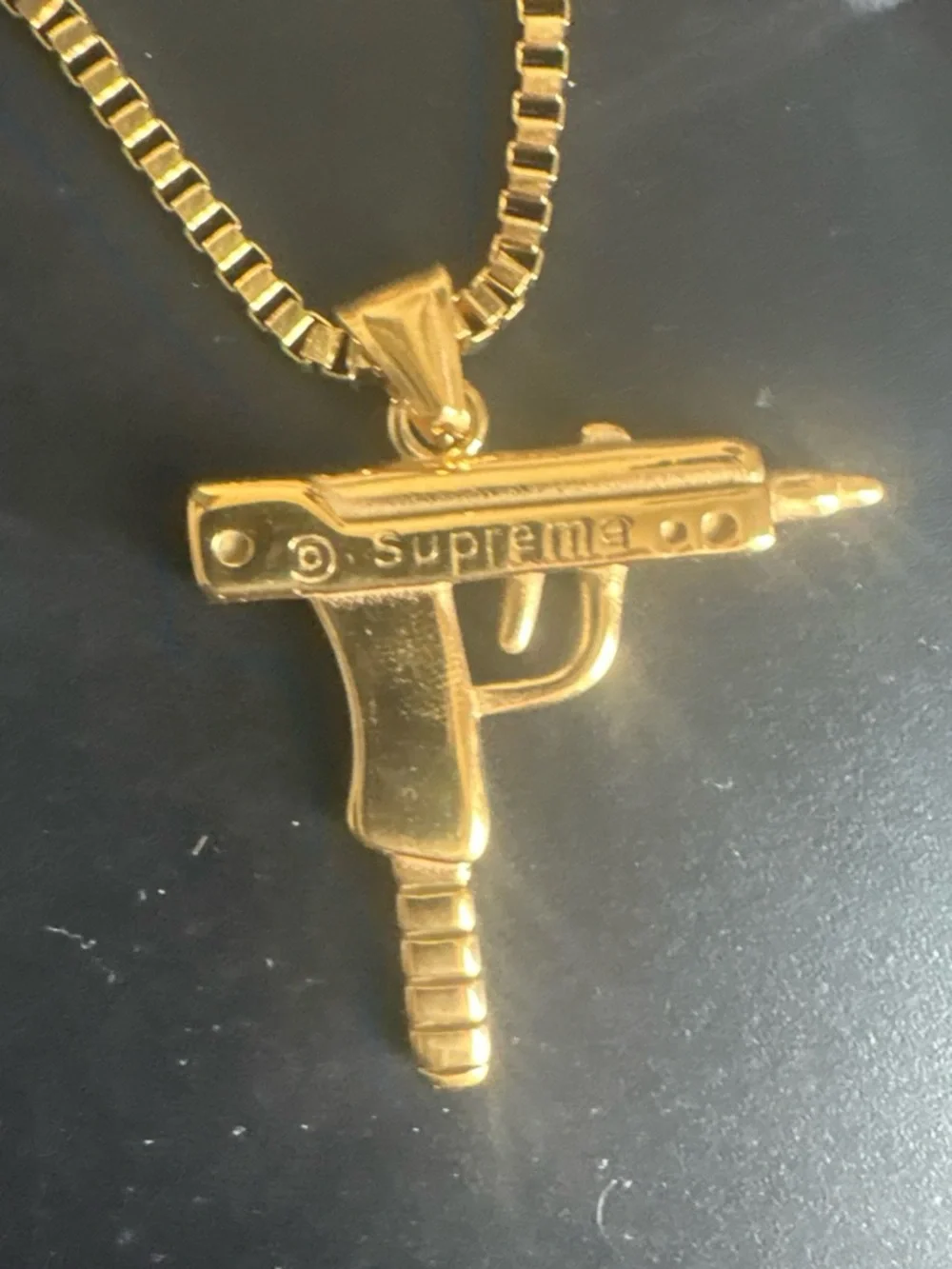Supreme Gold-tone Uzi Pendant Necklace